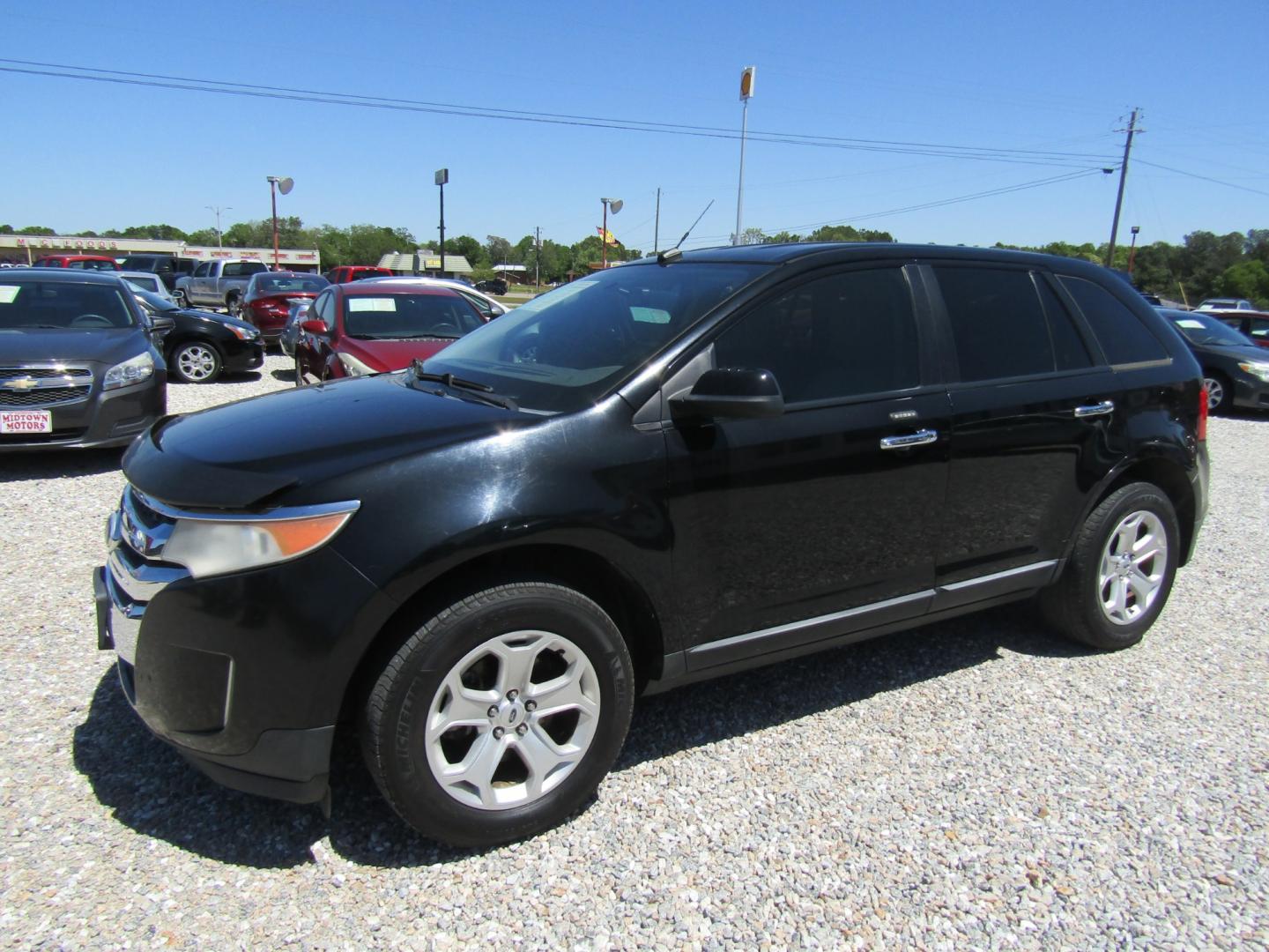 2011 Black /Tan Ford Edge SEL FWD (2FMDK3JC4BB) with an 3.5L V6 DOHC 24V engine, Automatic transmission, located at 15016 S Hwy 231, Midland City, AL, 36350, (334) 983-3001, 31.306210, -85.495277 - Photo#2
